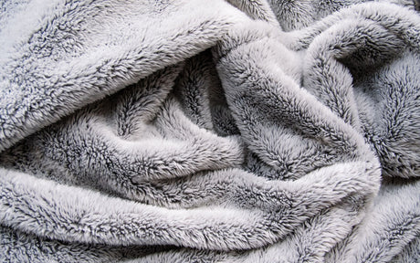 Les plaids au sèche-linge : bonne ou mauvaise idée ?